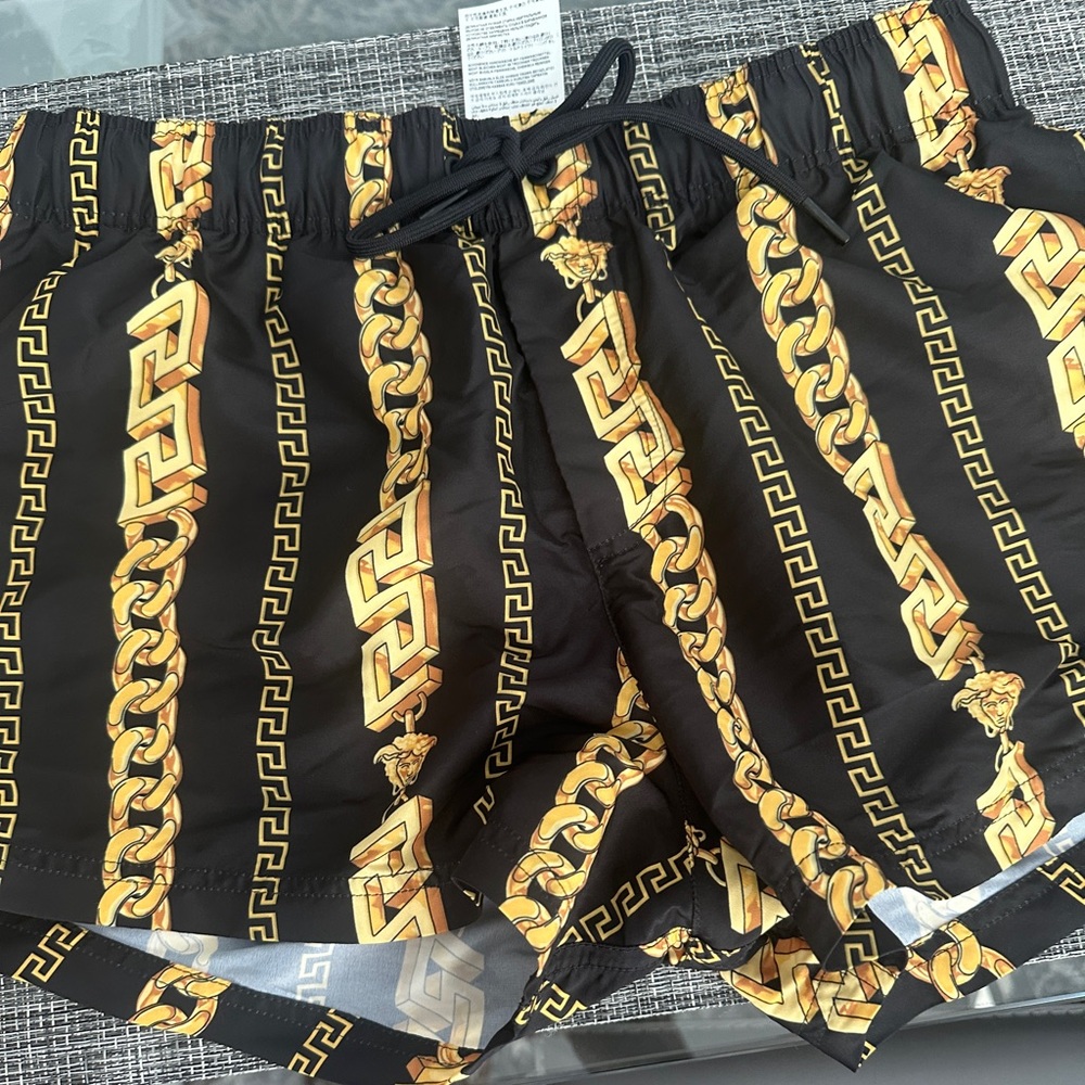 Men’s Versace swim trunks size 3.